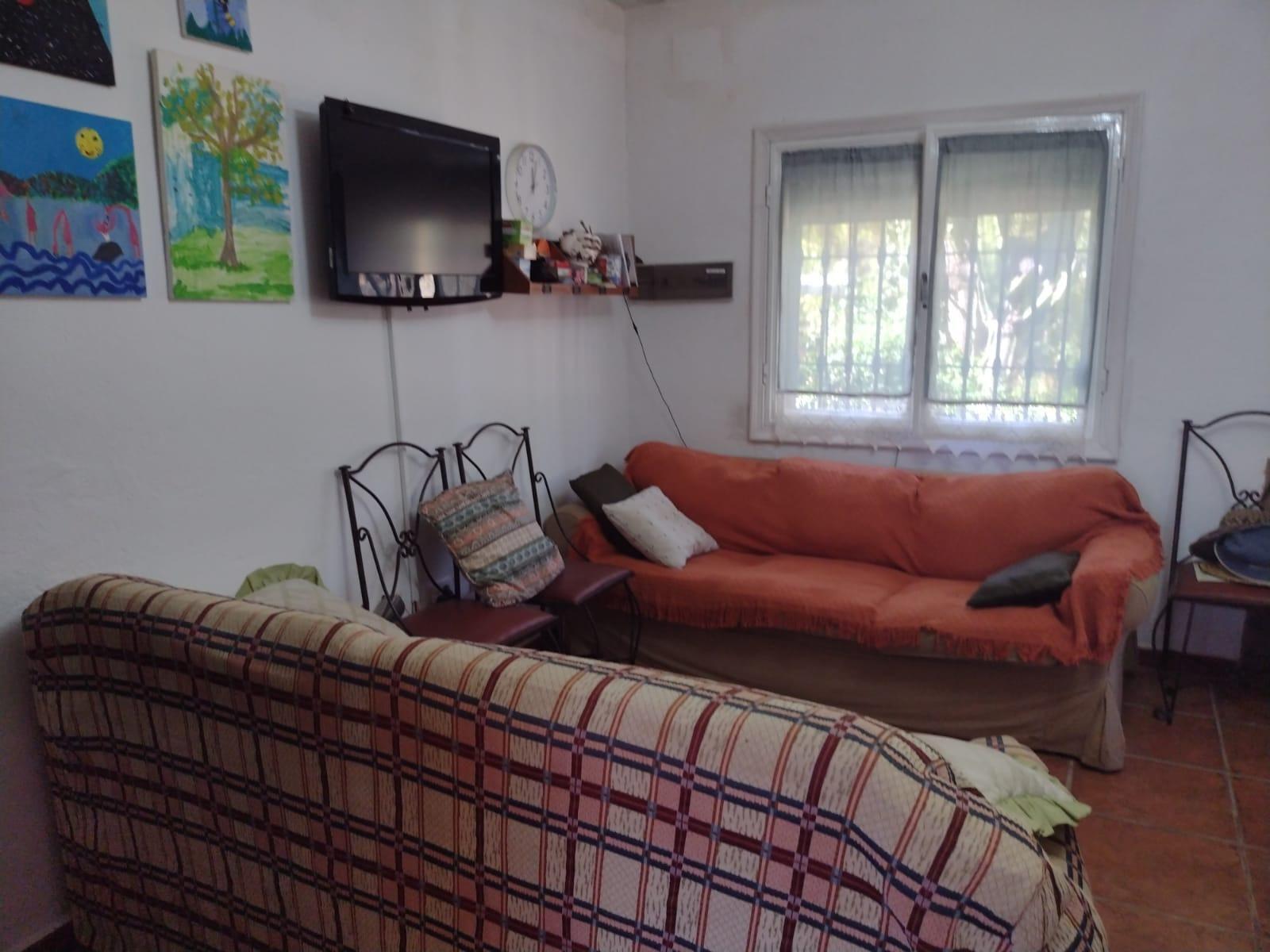 MAGNIFICA PARCELA DE CASI DOS HECTAREAS, CON CHALET Y PISCINA